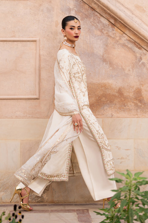 NAQSHI Gul-e-Rohma full outfit – beige raw silk shirt paired with embroidered culottes and organza dupatta